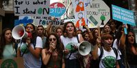epa07855988 Protesting school students call for climate change action during a Global Strike 4 Climate rally at Syntagma Square in Athens, Greece, 20 September 2019. The Global Strike 4 Climate is being held only days ahead of the scheduled United Nations Climate Change Summit in New York.  EPA-EFE/ORESTIS PANAGIOTOU
