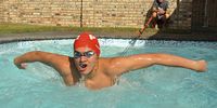Brandon Chalmers  practices long-distance swimming in his dad's pool during lockdown. (Photo: Mike Holmes)