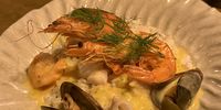 Utterly wonderful seafood risotto draped with prawns and studded with mussels in their shells. (Photo: Tony Jackman)