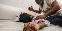 A Palestinian man mourns over the body of his dead son at the Al-Shifa hospital after an Israeli air strike in Gaza City, 09 October 2023. The Israeli army announced on 09 October, it carried out over 500 strikes on targets across the Gaza Strip overnight. Palestinian officials said almost 500 people were killed and over 2,700 were injured after Israel launched retaliatory raids and air strikes. An unprecedented attack on southern Israel on 07 October claimed by the Islamist movement Hamas killed more than 700 Israelis and left over 2,150 injured, the Israeli army said.  EPA-EFE/MOHAMMED SABER