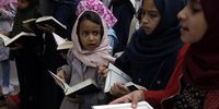 epa09168566 Yemeni children attend a class to learn the Arabic alphabet and to recite the holy book of the Koran during the fasting month of Ramadan at a mosque in the old city of Sana'a, Yemen, 29 April 2021. A set of children gather daily around a religious teacher to learn spelling and pronunciation in classical Arabic and recite the holy book of the Koran during Ramadan, at the courtyard of the Great Mosque in the old city of Sana'a. Muslims around the world celebrate the holy month of Ramadan by praying during the night time and abstaining from eating, drinking, and sexual acts during the period between sunrise and sunset. Ramadan is the ninth month in the Islamic calendar and it is believed that the revelation of the first verse in Koran was during its last 10 nights.  EPA-EFE/YAHYA ARHAB