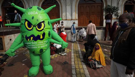 Biden doubles at-home US tests; South Africa registers 5,920 new cases