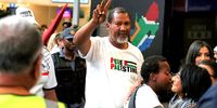 Mandla Mandela welcomed by his wife at the arrival of Global sumud flotilla delegates to Gaza at OR Tambo international airport on 08 October 2025. (Photo: Felix Dlangamandla)