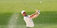 Rory McIlroy of Northern Ireland plays a shot from a bunker in the practice area during a practice round prior to the 2025 Masters Tournament at Augusta National Golf Club on April 08, 2025 in Augusta, Georgia. (Photo by Richard Heathcote/Getty Images)