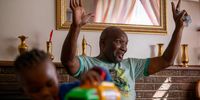 Former ANC councillor Jerry Ramokgoatedi and his three-year-old grandson Lethabo at his home in Carltonville on 15 May 2024. (Photo: Chris Collingridge)