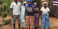 Ubaia Ureli (left) and his wife Mungui Anli (second left) lost contact with the rest of their family during the conflicts and live in a house with three other family members. (Photo: EPA-EFE / JOAO RELVAS)