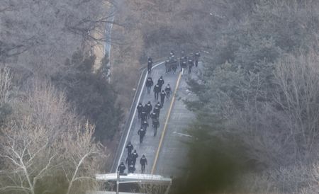 South Korean investigators arrest impeached President Yoon