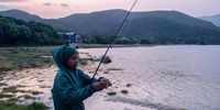 A young angler, part of the Tsitsikamma Junior Angling Forum, has learned traditional angling techniques from senior indigenous anglers like Edward Bernado. Nature's Valley Lagoon, 26 August 2025. (Photo: Julia Evans)