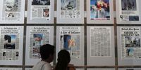 Visitors browse newspaper front pages with the story of the 9/11 terror attacks at the 9/11 Gallery of the Newseum on September 9, 2016 in Washington, DC. The nation will mark the 15th anniversary of the terror attacks on Sunday.  (Photo by Alex Wong/Getty Images)