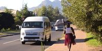 Many Kayamandi residents have a daily 5km walk from their homes to central Stellenbosch. The initial route along George Blake Road has good walking and cycling infrastructure, but that stops when pedestrians reach Adam Tas Road.<br>(Photo: Ashraf Hendricks)