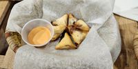 Cheese Sudanesa samosas photographed at Ko Cafe in Jersey City, New Jersey. (Photo: Naomi Campbell)<br>
