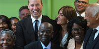 Prince William, Prince of Wales and Catherine, Princess of Wales laugh with members from the Windrush Cymru Elders after the prince made a joke while posing for a picture during a visit to the Grange Pavilion as they celebrates the beginning of Black History Month on October 03, 2023 in Cardiff, Wales. In celebration of the 75th anniversary of the arrival of HMT Empire Windrush, the Prince and Princess of Wales will meet members from the Windrush Cymru Elders, Black History Cymru 365 and the Ethnic Minority Youth Forum for Wales. (Photo by Geoff Caddick - WPA Pool /Getty Images)