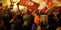 Supporters of Tunisian president Kais Saied celebrate after unofficial results in the Tunisian presidential election in the capital Tunis, Tunisia, 06 October 2024.  EPA-EFE/MOHAMED MESSARA