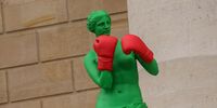 A Venus de Milo wearing boxing gloves is part of the group of sculptures for the installation 'Beauty and Gesture' by french artist Laurent Perbos on the steps of the French National Assembly for the duration of the Paris 2024 Olympic and Paralympic Games, in Paris France, 02 April 2024. Each sculpture represents the Venus de Milo performing an Olympic sport. The installation will be on view from 02 April through 22 September.  EPA-EFE/TERESA SUAREZ