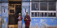 Hindu devotees offer prayers to Lord Narasimha Swamy outside their house during a chariot procession on the occasion of the Aani Narasimha Brahmotsavam festival, at Parthasarathy temple, in Chennai, India, 03 July 2023. Hundreds of Hindu devotees take part in a chariot procession by chanting sacred Vedas and offering prayers on the occasion of the Aani Narasimha Brahmotsavam festival of Lord Narasimha Swamy in the neighborhood of Triplicane, at the Parthasarathy temple, a 6th-century Hindu Vaishnavite temple dedicated to Lord Vishnu.  EPA-EFE/IDREES MOHAMMED