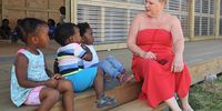 Glenda Brunette from Walmer Angels talking to some of the children at the new Creche 13. (Photo: Mike Holmes)