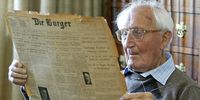 27 March 2007. South Africa. Cape Town. Gerhard Ewerwyn is 104 years old today. He is the oldest subscriber to Die Burger and is pictured with a copy of Die Burger dated 1933.