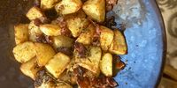 Rosemary and bacon make roast potatoes even better. (Photo: Tony Jackman)