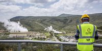 A worker looks out towards the Olkaria Geothermal Complex in Hells Gate National Park in Naivasha, Kenya. (Photo: Patrick Meinhardt / Bloomberg via Getty Images)