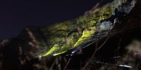 The iconic Table Mountain lit up for the fighters and survivors and those who have passed away from childhood cancer in Cape Town Tuesday, October, 6, 2020. The international awareness symbol for Childhood Cancer is a gold ribbon. This ribbon symbolises all forms of cancer affecting children and adolescents, unlike other ribbons, which focus on one particular cancer. Photo: Nardus Engelbrecht