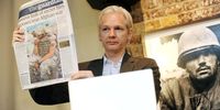 WikiLeaks founder Julian Assange shows an issue of The Guardian during a press conference at the Frontline Club in London, Britain, 26 July 2010, to discuss the 75,000 Afghan war documents that the organization made available to The New York Times, The Guardian and Germany's Der Spiegel. Alexander Arbuthnot began working for cyber security company Symantec in 2010. Symantec has published various materials on how to 'avoid a repeat of WikiLeaks'.(Photo: EPA / Stringer)