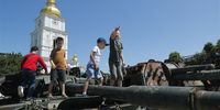 Children play on the damaged Russian military machinery displayed during an event to support children, near St. Mykhailivsky Cathedral in Kyiv, Ukraine, 04 June 2023 amid the Russian invasion. Ukrainians mark the 'Day of Remembrance of Children' who died as a result of the armed aggression of Russia against Ukraine. At least 485 Ukrainian children were killed and more than one thousand were injured. In addition, almost 20,000 Ukrainian children were deported to the territory of the Russian Federation in the period from 24 February 2022, according to Kyiv City Military Administration. The event was founded by the Resolution of the Verkhovna Rada of Ukraine (Parliament) in 2021, coinciding with the UN’s International Day of Innocent Children Victims of Aggression, annually on June 04.  EPA-EFE/SERGEY DOLZHENKO