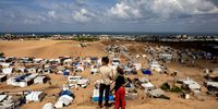 Two children stand at an area overlooking tents at a camp for displaced people in Khan Yunis camp, southern Gaza Strip, 22 September 2024. According to the UN, at least 1.9 million people (or nine in ten people) across the Gaza Strip are internally displaced, including people who have been repeatedly displaced. Since October 2023, only about 11 percent of the Gaza Strip has not been placed under Israeli-issued evacuation orders, the UN aid coordination office OCHA said. More than 41,300 Palestinians and over 1,400 Israelis have been killed, according to the Palestinian Health Ministry and the Israel Defense Forces (IDF), since Hamas militants launched an attack against Israel from the Gaza Strip on 07 October 2023, and the Israeli operations in Gaza and the West Bank which followed it.  EPA-EFE/HAITHAM IMAD