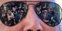 Reporters are reflected in the sunglasses of US President Joe Biden as he speaks to the press before boarding Marine One on the South Lawn of the White House on 6 October 2022 in Washington, DC. (Photo:  Drew Angerer / Getty Images)