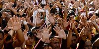 Catholic devotees participate in the procession marking the feast day of the Black Nazarene at the old district of Quiapo in Manila, Philippines, 09 January 2024. The Black Nazarene feast day honoring Jesus Christ is one of the first major celebrations for Catholics at the start of every year, and is highlighted by a whole day procession of barefoot devotees.  EPA-EFE/FRANCIS R. MALASIG