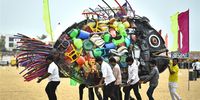 Volunteers carry an installation depicting a fish made from plastic waste to create awareness of environment polution effect on marine life,  at Edward Elliot's beach, in Chennai, India, 21 May 2023. (Issued 02 June 2023).  According to the report issued by Swachh Bharat Mission (Urban) Plastic Waste Management Solutions and Case Studies, government of India, it is estimated that approximately 70% of plastic packaging products are converted into plastic waste in a short span. Approximately 9.4 million TPA plastic waste is generated in the country, about 60% is recycled, most of it by the informal sector. While the recycling rate in India is considerably higher than the global average of 20%3 there is still over 9,400 tonnes of plastic waste which is either landfilled or ends up polluting streams or groundwater resources.The world mark the World Environment Day on 5 June 2023 and it will focus on plastic Pollution and solutions to plastic Pollution.  EPA-EFE/IDREES MOHAMMED  ATTENTION: This Image is part of a PHOTO SET