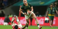 Bok centre Jesse Kriel evades the challenge of Japan's Charlie Lawrence. (Photo: Luke Walker/Getty Images)