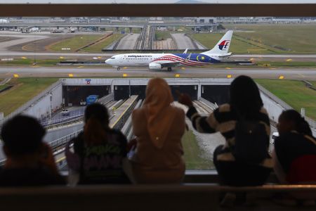 Malaysia extends search for missing flight MH370 by one year