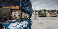 Trailers loaded with goods from South Africa stand near Beitbridge in 2019. The Zimbabwean economy has deteriorated since then, with inflation soaring 175%. (Photo: Waldo Swiegers/Bloomberg via Getty Images)