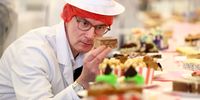 Judge, Iain Campbell poses for a photograph as he views baking at Carnegie Conference Centre during judging for Scottish Baker of the Year Awards on March 20, 2024 in Dunfermline, Scotland. Now in its 10th edition, the competition is organised by Scottish Bakers, an industry association that has been supporting and protecting Scotland's bakery trade for over 130 years. Bakers were invited to enter up to 12 products of their choosing to be taste-tested by a panel of expert judges. (Photo by Jeff J Mitchell/Getty Images)