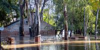 Floodwaters from the Vaal River rise more than halfway up a church at Pont de Val, a wedding venue just below the Vaal Barrage near Parys, after heavy rainfall and controlled releases from the Vaal Dam, 30 April 2025. (Photo: Julia Evans)