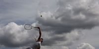 Ella McDonald of Great Britain serves against Rebecca Munk Mortensen of Denmark in the Girl's Singles during day eight of The Championships Wimbledon 2023 at All England Lawn Tennis and Croquet Club on July 10, 2023 in London, England. (Photo by Julian Finney/Getty Images)