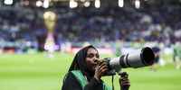 epa10321406 A photographer takes pictures of spectators in the stands before the FIFA World Cup 2022 group D soccer match between France and Australia at Al Janoub Stadium in Al Wakrah, Qatar, 22 November 2022.  EPA-EFE/JOSE SENA GOULAO PORTUGAL OUT