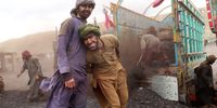 Pakistani miners pose for a photo as laborers work at a coal mine, on the International Workers' Day, in Quetta, Pakistan, 01 May 2023. Labor Day or May Day is an annual holiday that takes place on 01 May, it celebrates laborers, their rights, achievements and contributions to society.  EPA-EFE/FAYYAZ AHMAD