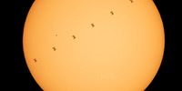 NOTTINGHAM, MD - APRIL 23: In this NASA handout, This composite image made from six frames shows the International Space Station, with a crew of seven aboard, is seen in silhouette as it transits the sun at roughly five miles per second, Friday, April 23, 2021, as seen from Nottingham, Maryland. Aboard are: NASA astronauts Shannon Walker, Mike Hopkins, Victor Glover, Mark Vande Hei; Roscosmos cosmonauts Oleg Novitskiy, Pyotr Dubrov; and Japan Aerospace Exploration Agency (JAXA) astronaut Soichi Noguchi. Joining the crew aboard station tomorrow will be Crew-2 mission crew members: NASA astronauts Shane Kimbrough and Megan McArthur, JAXA astronaut Akihiko Hoshide, and ESA (European Space Agency) astronaut Thomas Pesquet. Photo Credit: (Photo by Bill Ingalls/NASA via Getty Images)