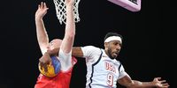 Kareem Maddox #9 of Team United States blocks a shot from Adrian Bogucki #15 of Team Poland during a Men's Pool Round match on day five of the Olympic Games Paris 2024 at Esplanade Des Invalides on July 31, 2024 in Paris, France. (Photo by Ezra Shaw/Getty Images)