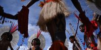 Indigenous people from different ethnicities attend a demonstration of the Acampamento Terra Livre (Free Land Camp) in Brasilia, Brazil, 23 April 2024. Thousands of indigenous people take part in different activities during this week in Brasilia before their annual meeting in protest for the territorial and cultural rights of the native peoples of the Free Land Camp.  EPA-EFE/Andre Borges