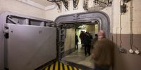 BAD NEUENAHR-Visitors tour the Cold War-era former West German government bunker on May 03, 2023 near Bad Neuenahr-Ahrweiler, Germany. The bunker, built at the site of a railway tunnel inside hills, had the capacity to sleep 936 people, had over 800 office rooms and would have served as a shelter to keep the West German government functioning in the event of war. Russia's current war in Ukraine and its recent stationing of nuclear missiles in Belarus has revived memories of the Cold War. Both West and East Germany had extensive bunker systems that Germany's post-reunification government chose to abandon in 2007, citing the post-Cold War era peace dividend and claiming that bunkers would be largely useless in the event of a nuclear war anyway. (Photo by Thomas Lohnes/Getty Images)