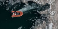 ISTANBUL, TURKEY - JUNE 10: A boat passes through a thick layer of 'sea snot' in the Marmara Sea on June 10, 2021 in Istanbul, Turkey. The coastline of Turkey's Marmara Sea has been covered with a thick layer of slime, known as marine mucilage or 'sea snot'  The mucilage develops as a result of untreated waste dumped into the sea, climate change and the excessive proliferation of phytoplankton. More than 25 sea surface-cleaning and barrier-laying boats, have been deployed to clean up and  prevent the spread of the mucilage which threatens marine life and Istanbul's fishing industry.  (Photo by Chris McGrath/Getty Images)