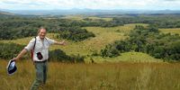 Prof William Bond in the grasslands of Lope Park, Gabon – a 5,000 square kilometre Unesco World Heritage Site consisting of rainforest and grassland savannahs. The western lowland gorilla and countless other mammals and bird species have found refuge in this diverse landscape. (Photo: Supplied)