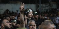 Palestinians attend a rally by militants at the Jenin refugee camp near the West Bank city of Jenin 10 June 2022, marking a year since three Palestinian were killed in a raid in Jenin by Israeli troops.  EPA-EFE/ALAA BADARNEH