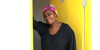 04/02/2022 Candice Moyo-Zizo stands outside her social housing unit at Conradie Park, Pinelands, on 4 February 2022. (Photo: Tamsin Metelerkamp)