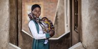 An adolescent mother and her newborn baby, in Malawi. This eastern and southern African country has one of the highest child marriage rates in the world — 42% of girls are married before age 18 and 9% before the age of 15. (Photo: UNFPA  / Luis Tato)