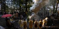 TAMBASASAYAMA, JAPAN - JANUARY 03: Mountain priests (Yamabushi) perform a new year sacred fire ritual during a Fudo honor festival on January 03, 2022 in Tambasasayama, Japan. The Yamabushi chant and pray as worshipers walk barefoot on the burnt logs and wish for good health and happiness in the new year. Due to the coronavirus pandemic the event was canceled last year. (Photo by Buddhika Weerasinghe/Getty Images)