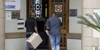 The Special Investigative Unit (SIU) officials rare seen entering the National Lotteries Commission offices during a raid in Pretoria, on Tuesday 8 November, 2020.<br>Picture: Phill Magakoe