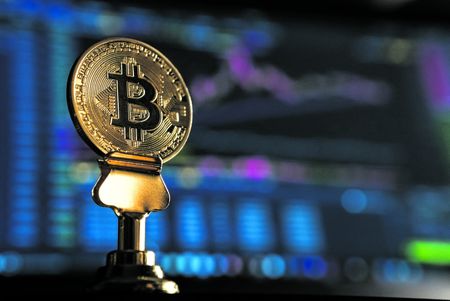 Goldman Says Bitcoin $100,000 a Possibility by Taking on Gold